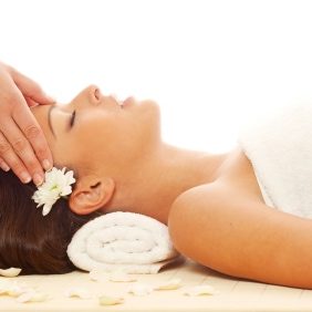 75574249-2774-4B06-B5CB-2DED72C092B6.jpeg Young attractive girl receiving head massage at spa resort
