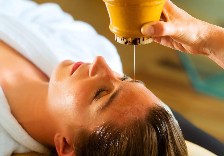 Close-up of young woman having reflexology