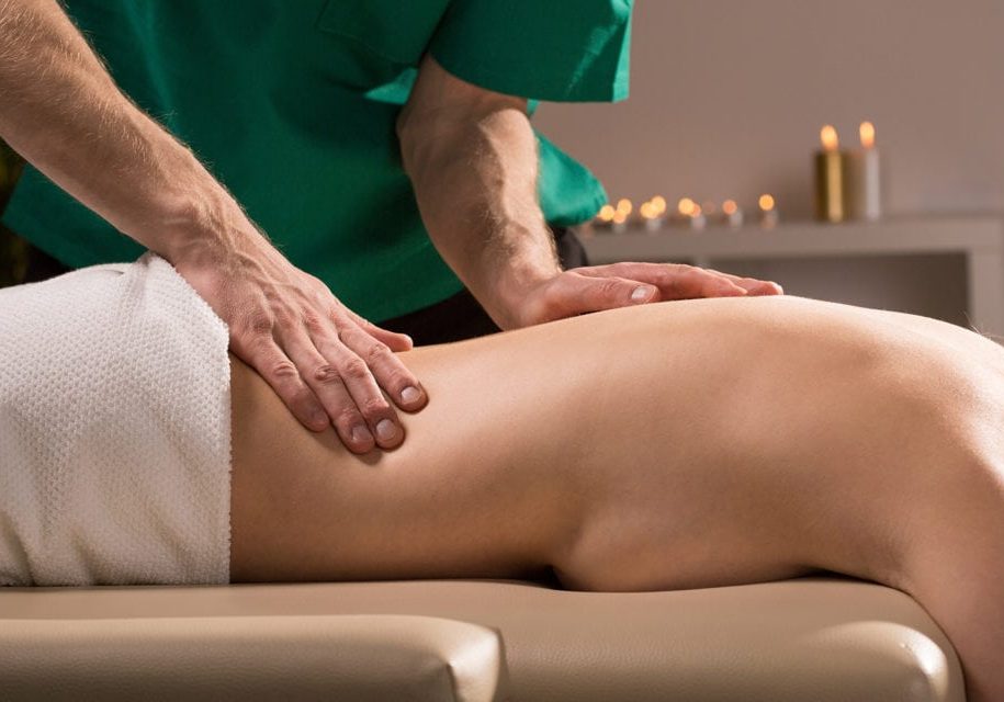 Close-up of young woman having reflexology