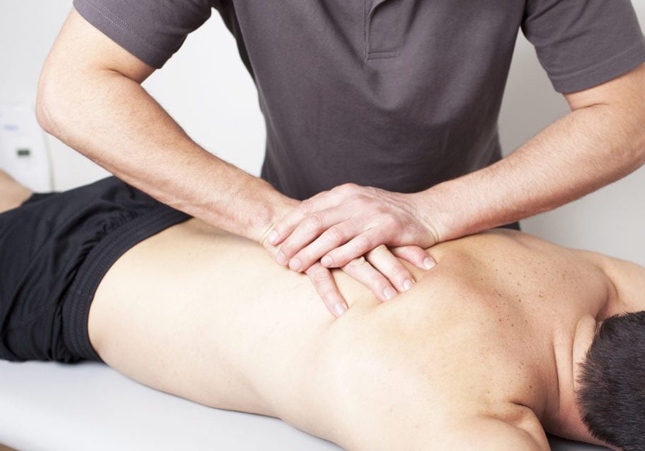 Close-up of young woman having reflexology