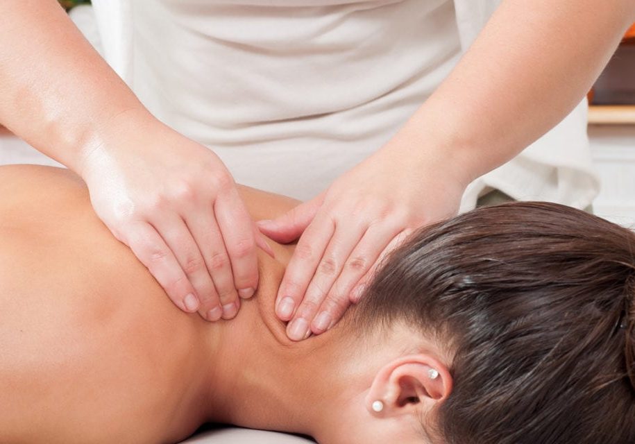 Close-up of young woman having reflexology