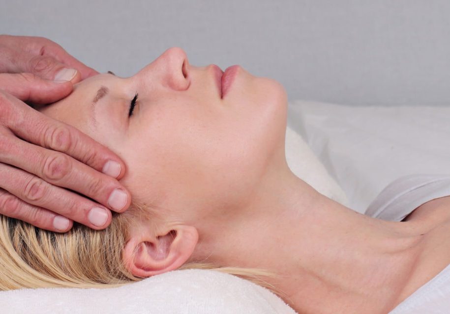 Close-up of young woman having reflexology